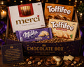 Chocolate Box (Merci 250 g, Toffifee cu alună și Toffifee cu ciocolată albă, completate de Milka Bubbly White )